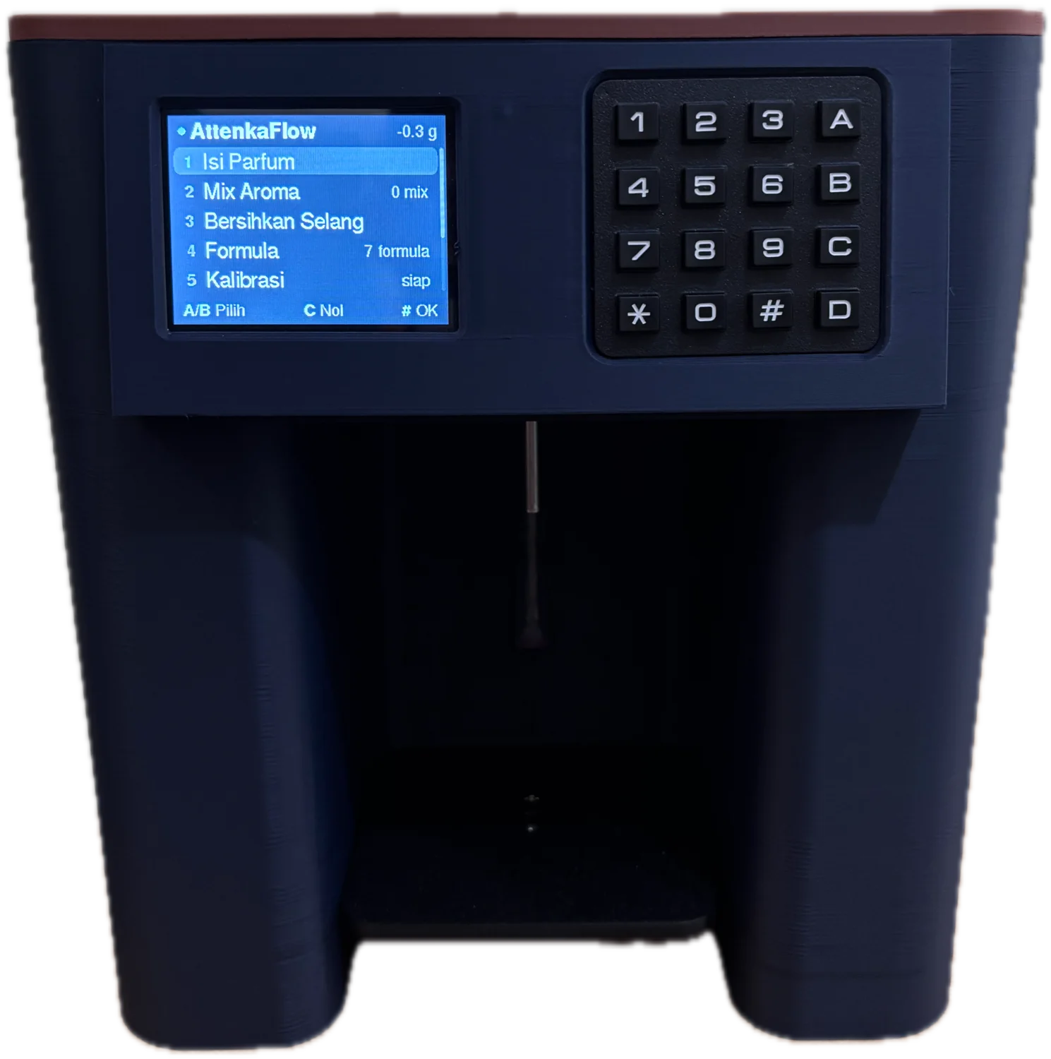 Mesin AttenkaFlow tampak depan, dengan layar warna dan keypad di atas ruang botol.
